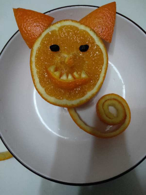 水果拼盘图片 小朋友的橘子小怪兽做法