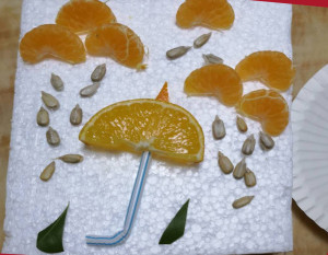 水果橘子制作的创意美术作品 雨天的风景