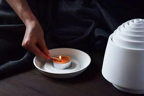 只需一根蜡烛的暖手器创意设计